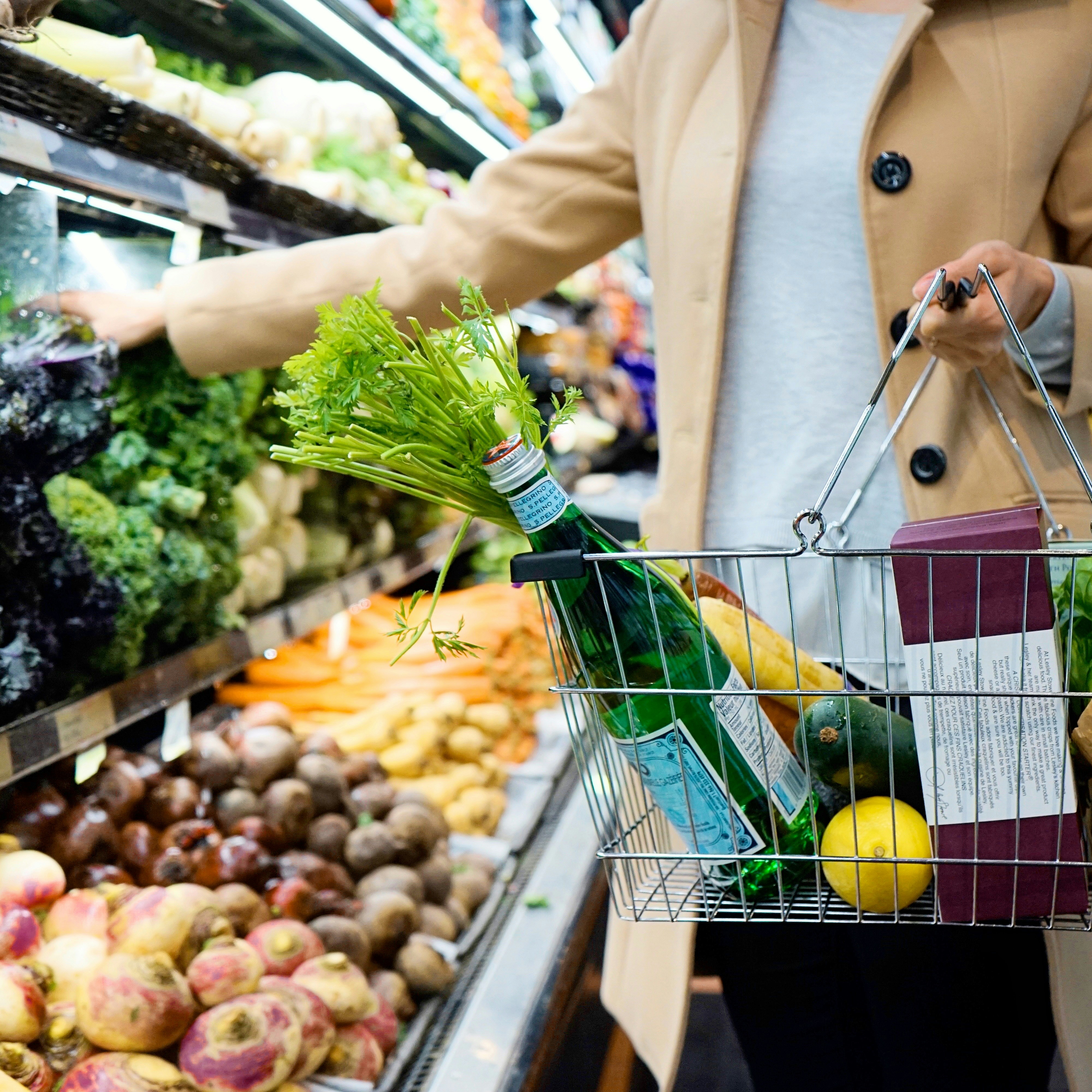 Grocery shopper selecting fresh produce
